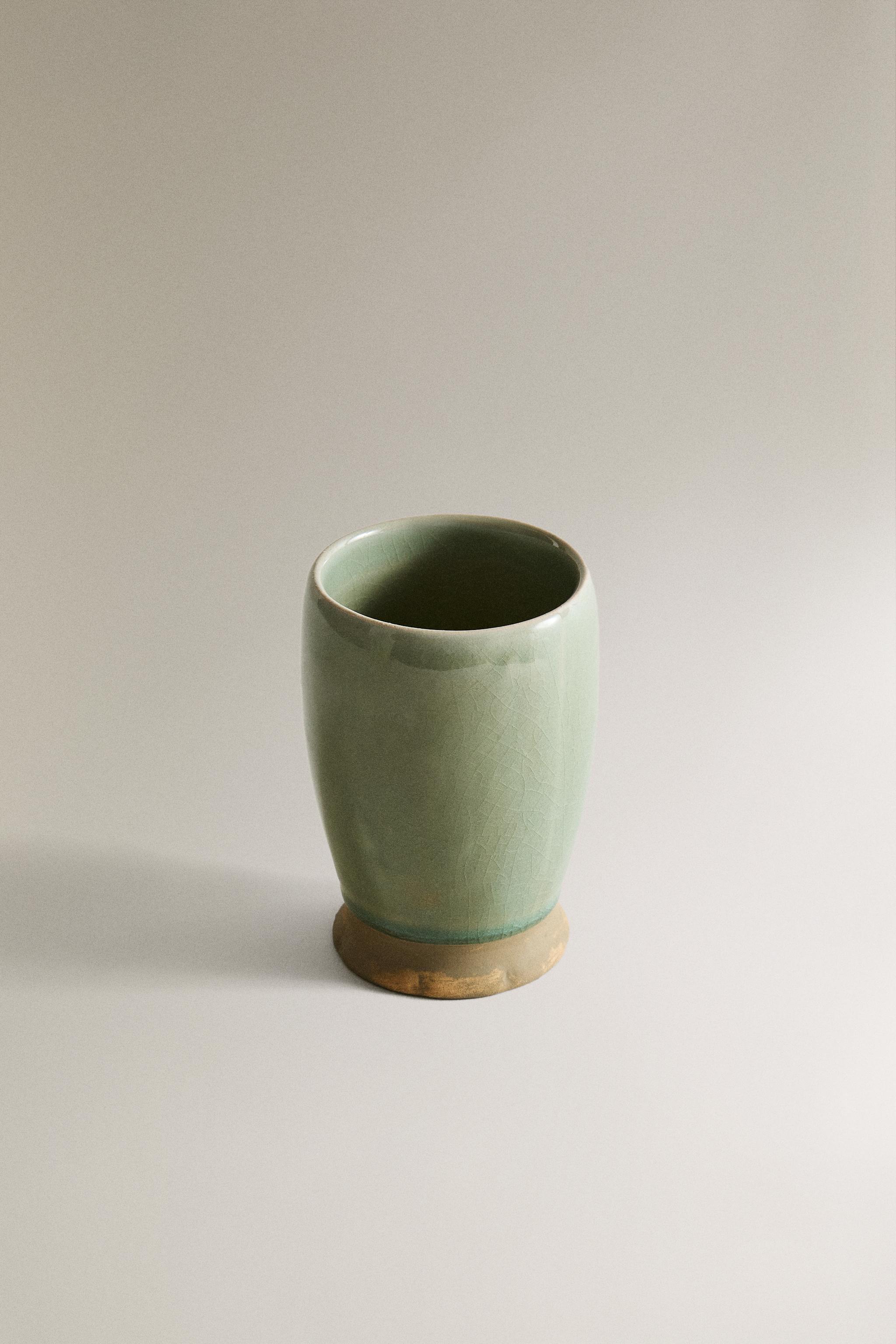 GREENISH TOOTHBRUSH HOLDER